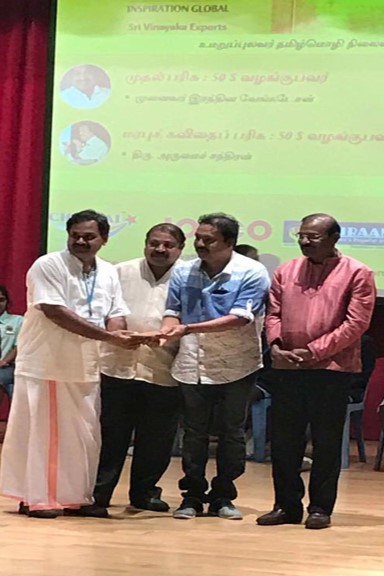 Receiving prize for poetry competition 